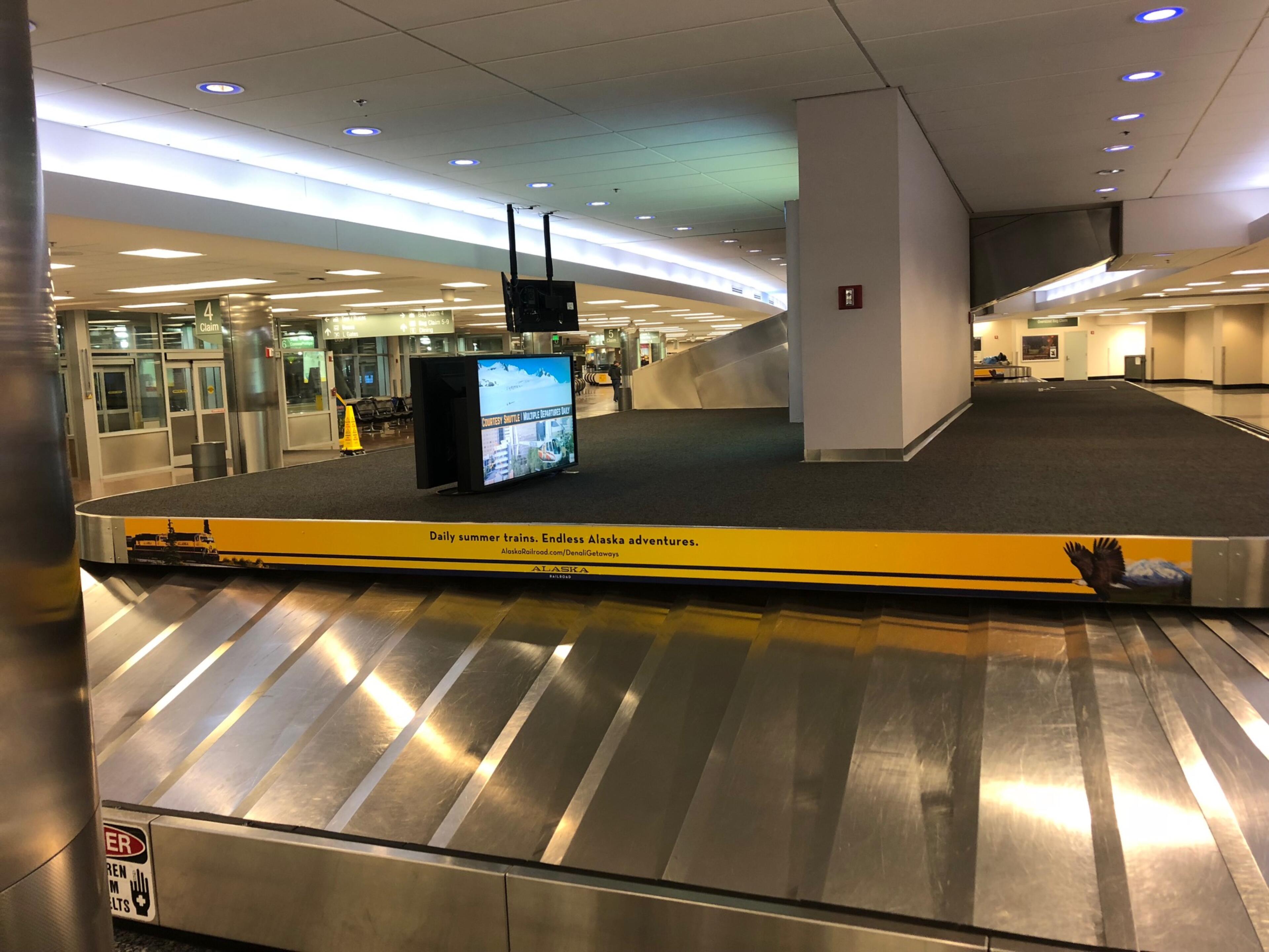 Baggage Claim Vinyl Wraps Alaska Channel